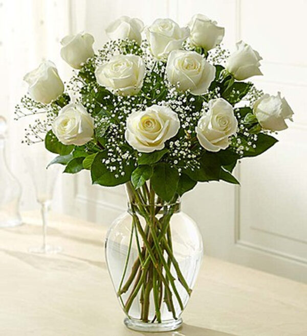 1 Dozen White Roses Arranged In A Glass Urn A Dozen Long Stemmed Rose Arrangement In A Glass Urn/Vase With Greenery