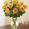 A Dozen Long Stemmed Rose Arrangement In A Glass Urn/Vase With Greenery