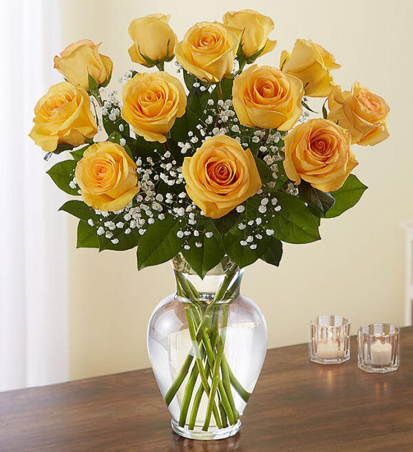 1 Dozen Yellow Roses Arranged In A Glass Urn A Dozen Long Stemmed Rose Arrangement In A Glass Urn/Vase With Greenery