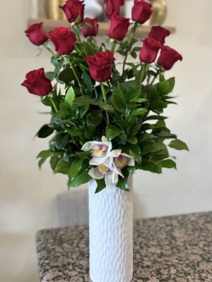 A Dozen Long Stemmed Red Roses with Cymbidium Orchids in a Ceramic White Vase